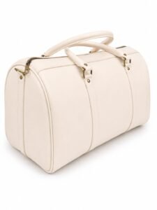 Sac de voyage en cuir crème vu de côté