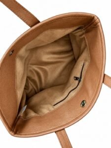 Intérieur du sac à main avec doublure et poche zippée